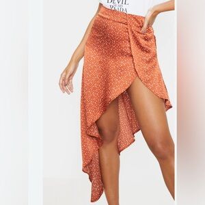 PrettyLittleThing Orange Asymmetrical Wrap Mini Skirt